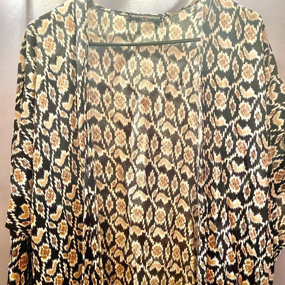 Brandy Melville, One size fits all, solid black with beige and white pattern.